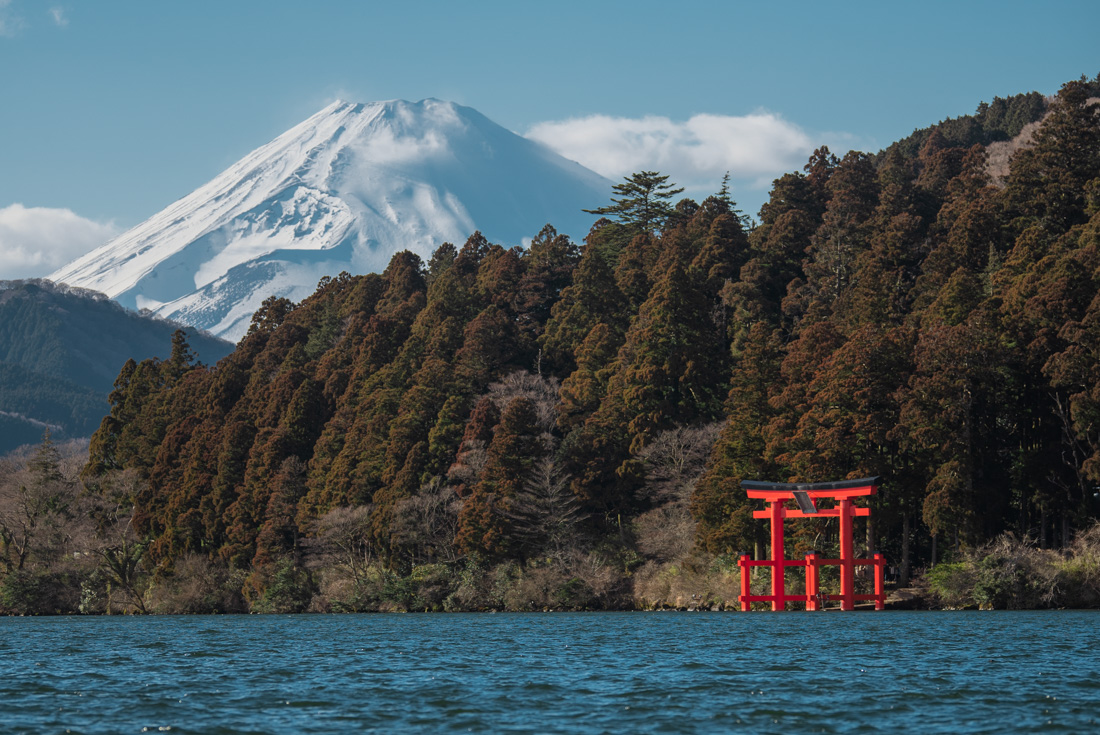 Hakone shrine gate with Mount Fuji looming beyond in autumn in Japan