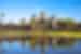 TKPC - View of Angkor Wat across lake on a sunny day