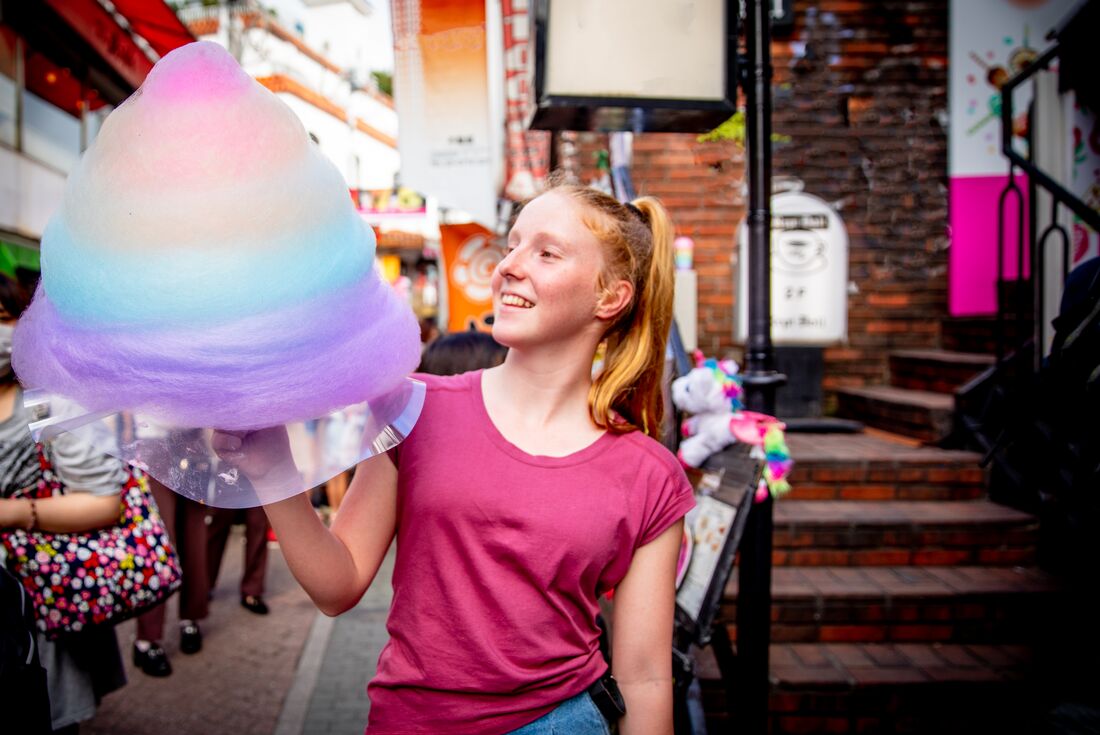 Stopping for cotton candy on a tour of Harajuku in Tokyo