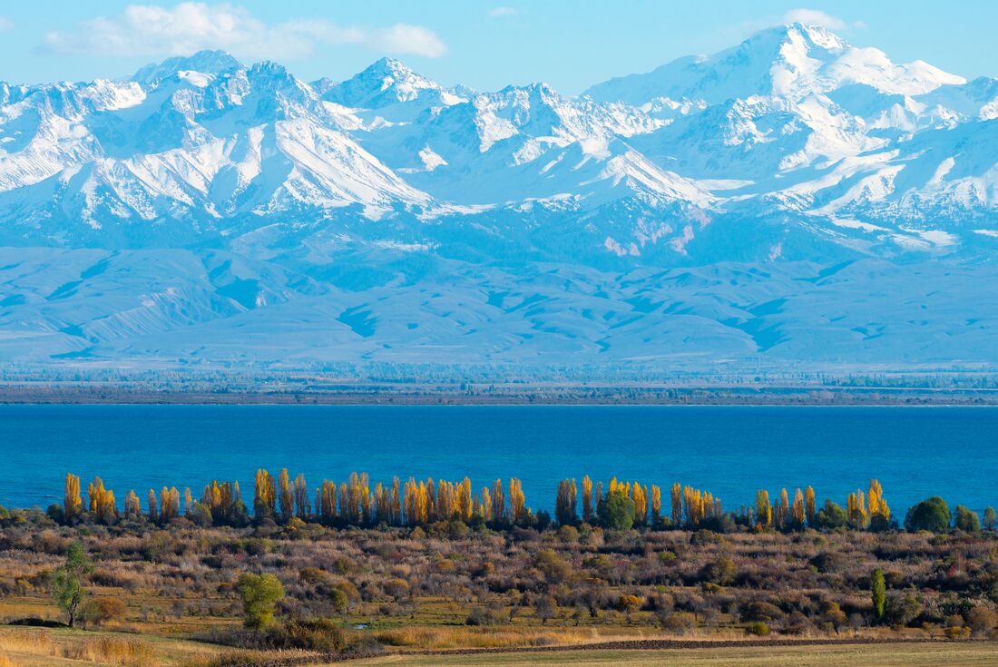Issyk-kul lake, second largest mountain lake in the world, surrounded by forested shores and mountains