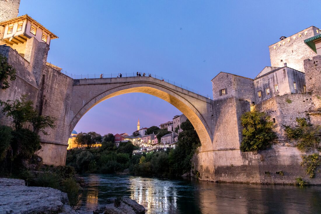 Iconic 14th century Mostar Bridge in Bosnia and Herzegovina in the evening
