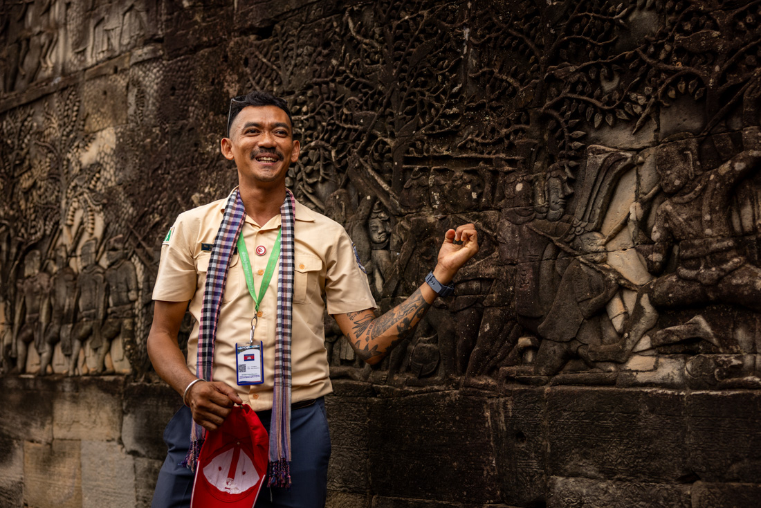 Leader Fila gives a talk about the carvings at Angkor Wat
