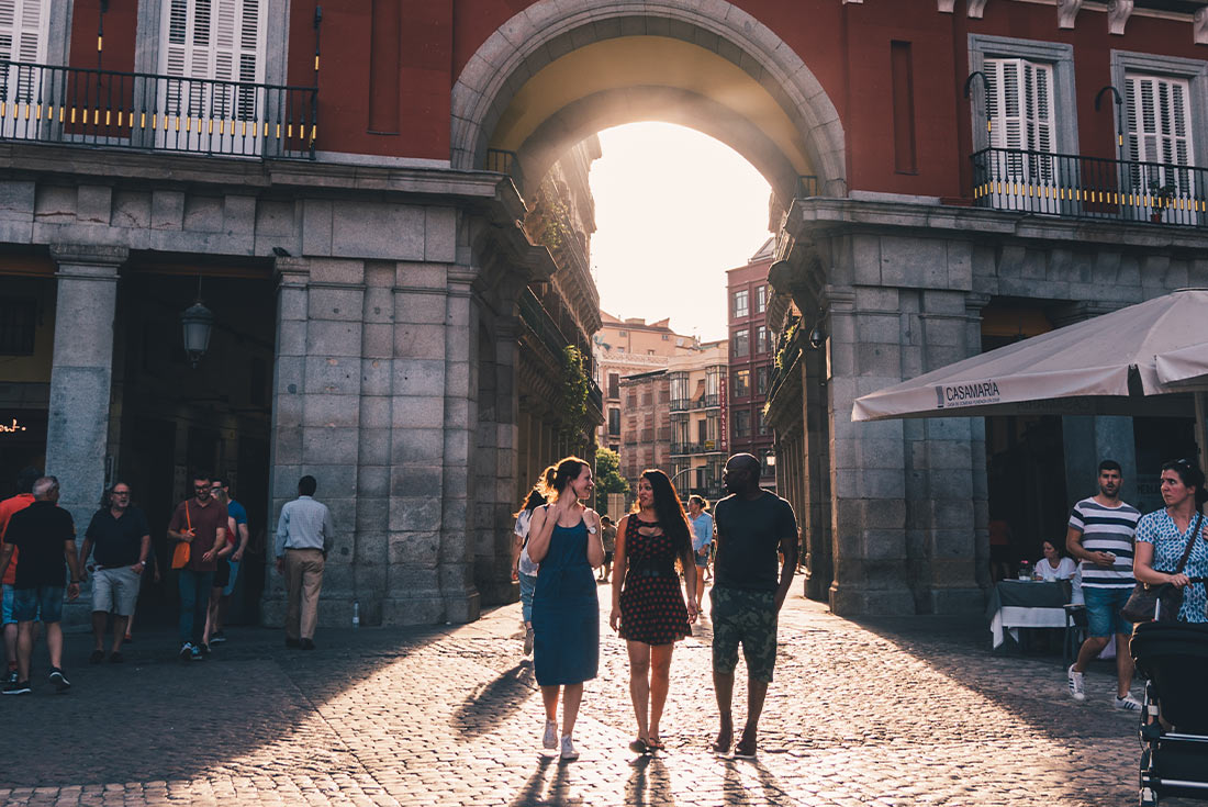 Travellers walking through the streets of Madrid, Spain
