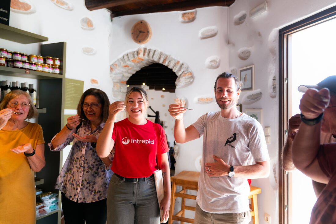 Intrepid group sample fresh olive oil on Naxos island in the Cyclades Greece