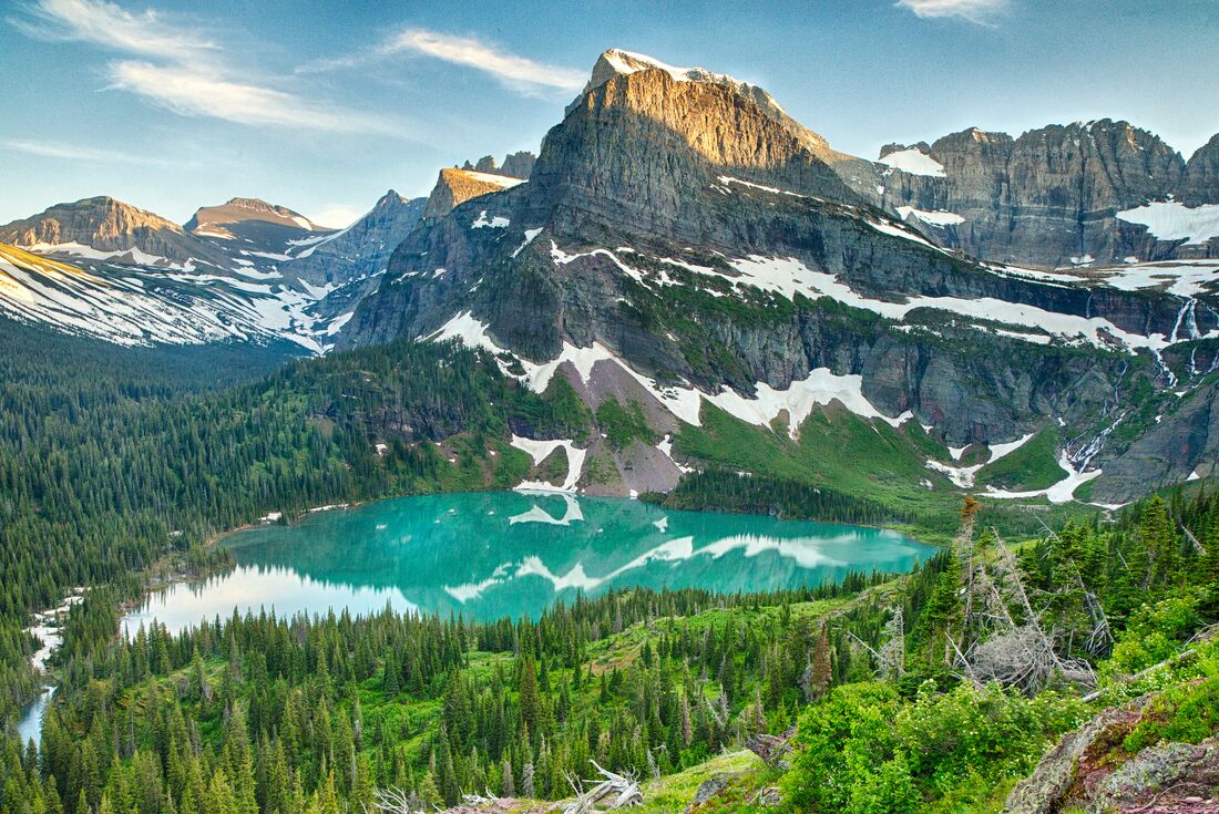 Looking out over Grinnell Lake valley in the mountains of Glacier National Park in Montana