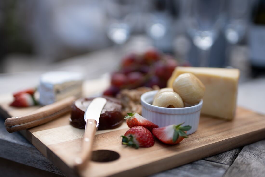 Close up details of fruit and cheese platter