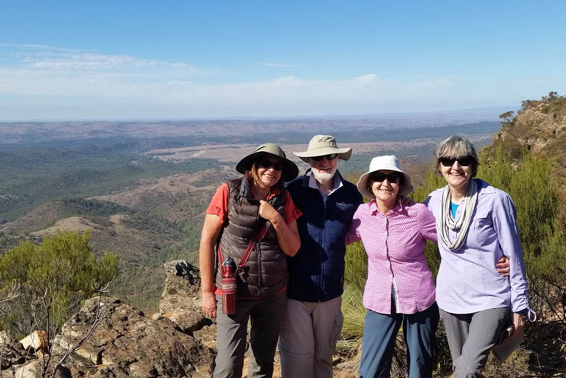 Group of travellers in front of Tanderra Saddle, Flinders Ranges, South Australia