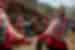 Huilloc community dances with Intrepid travellers in Sacred Valley Peru